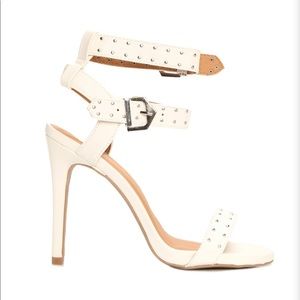 White strappy heeled sandals